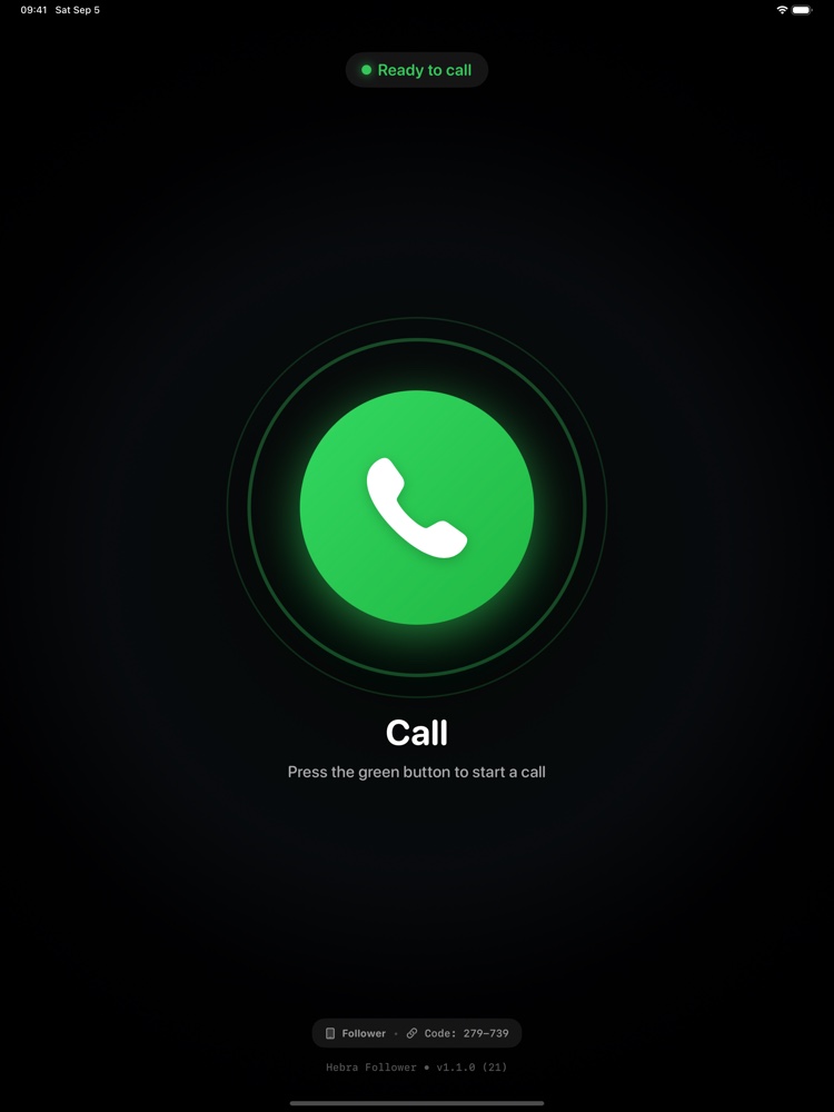 The Hebra calling screen on an iPad: a single large green call button on a black background.
